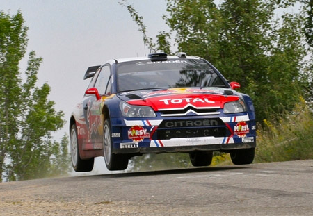 Loeb jumps his Citreon C4 rally car at WRC Rally Bulgaria.