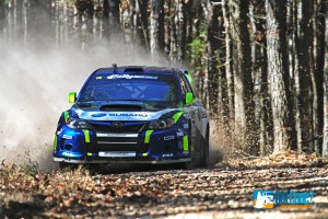David Higgins tearing through the forest in his Subaru Rally Car