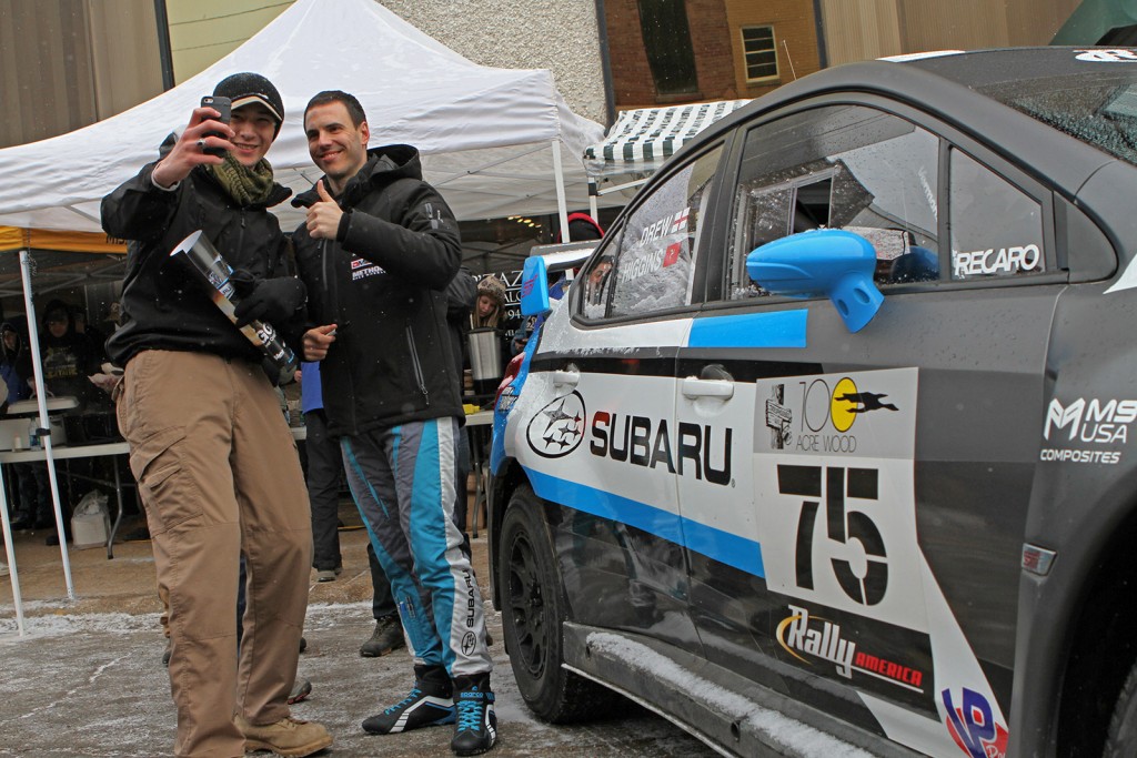 Craig Drew of Subaru Rally Team USA SRTUSA takes a selfie with a fan
