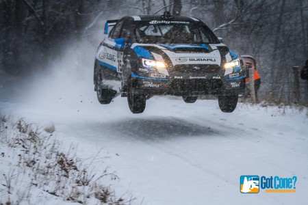 Subaru Rally Team USA driver David Higgins takes the jump at 2015 Rally in the 100 Acre Wood